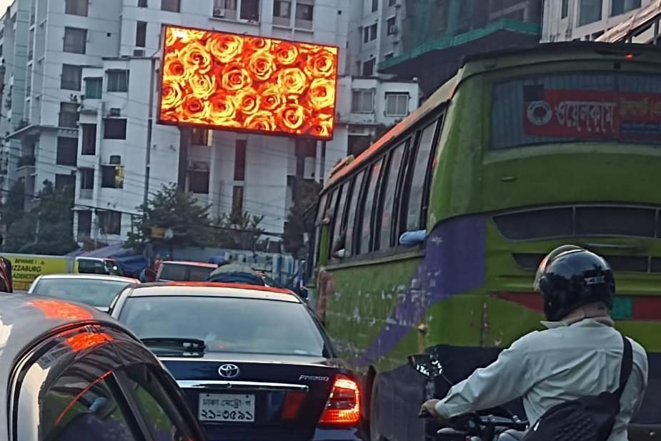 Manik Mia Avenue Aarong Signal LED billboard in Dhaka, facing Khamar Bari